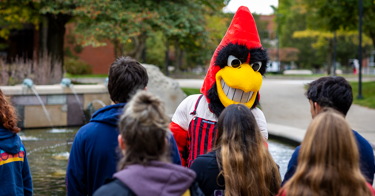 Charlie Cardinal interacting with students.
