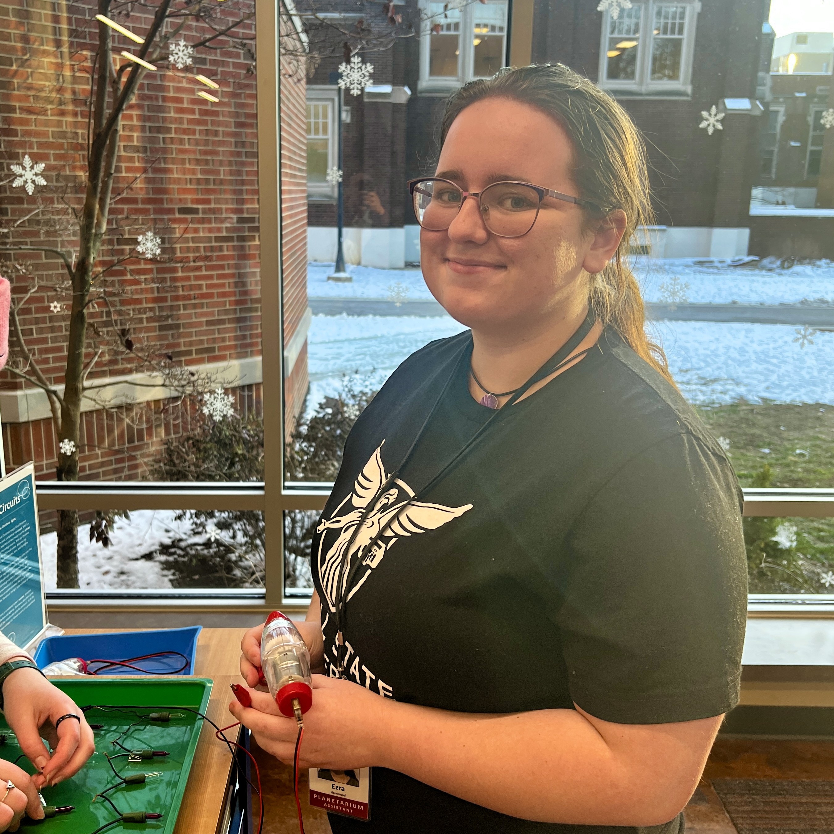 Ezra at an activity station